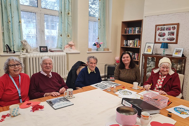 sioned williams sitting around a table