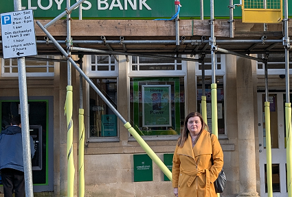 Sioned Williams is standing outside Lloyds Bank in Pontardawe