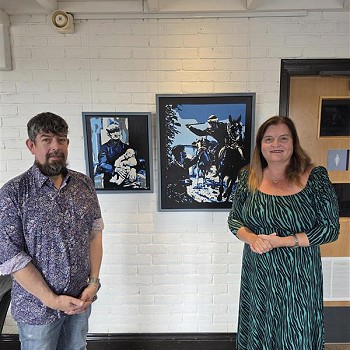 Sioned and Paul with some of his art