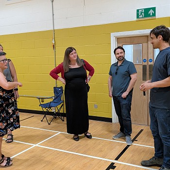 Sioned and volunteers in the gymnasium
