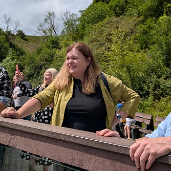 Sioned and Beca with hosts looking across the valley