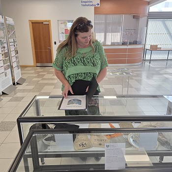 Sioned looking at exhibits